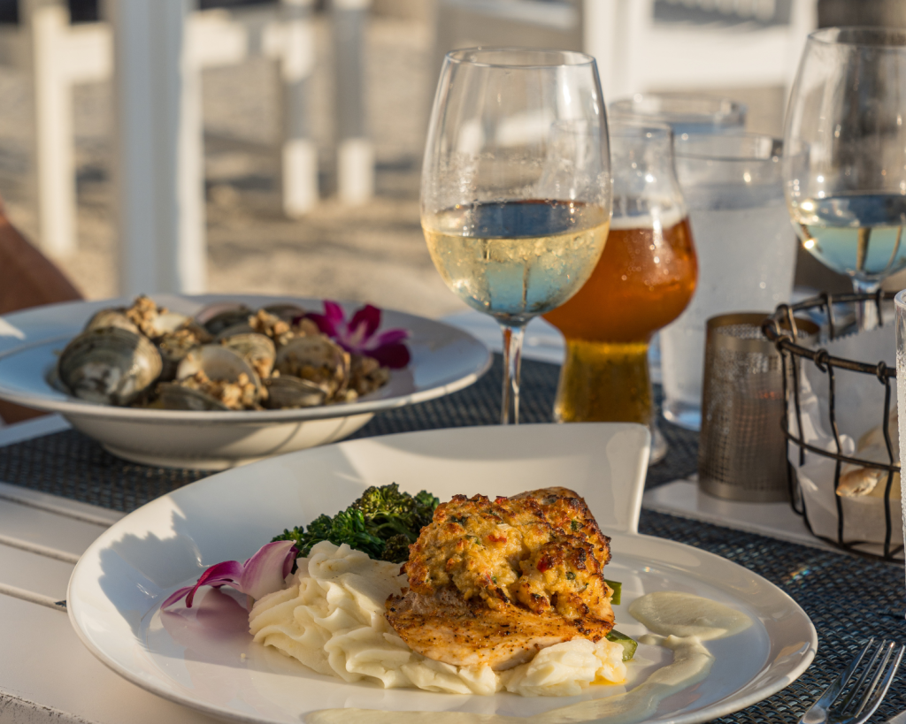 Fresh seafood and pasta served with drinks at Isla Bella all inclusive resort in Marathon Florida Keys