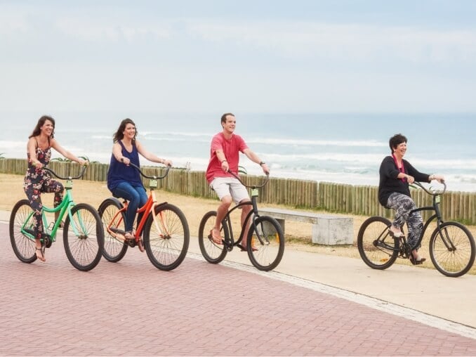 A Group of Adults Enjoying a Bike Ride By The Beach in the Florida Keys