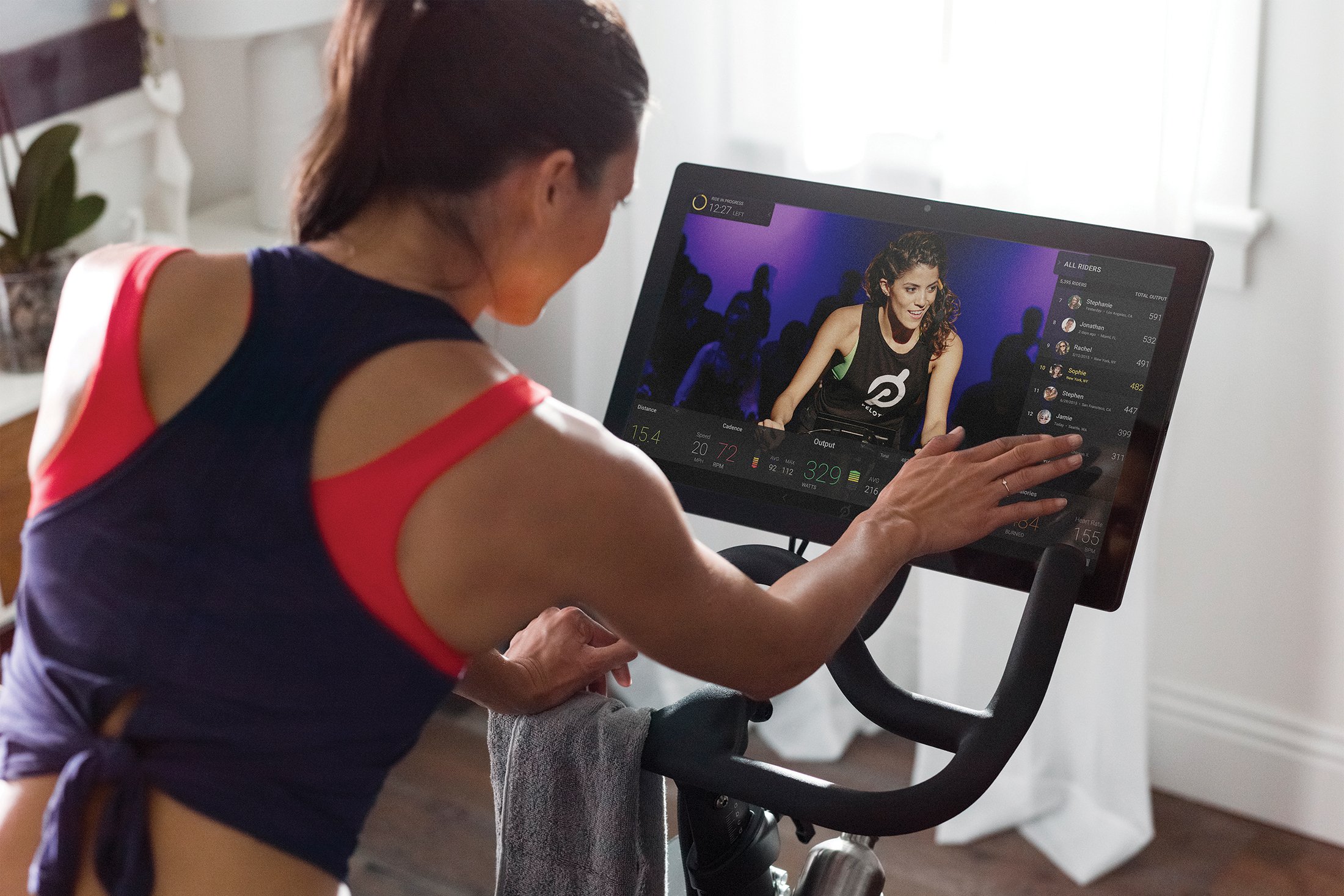 Woman Running on an Elliptical in Isla Bella's New Fitness Center in the Florida Keys