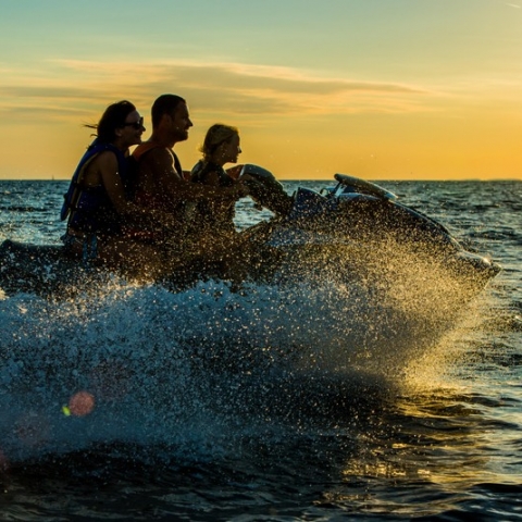 Riding A Jet Boat At Sunset