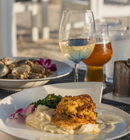 Fresh seafood and pasta served with drinks at Isla Bella all inclusive resort in Marathon Florida Keys